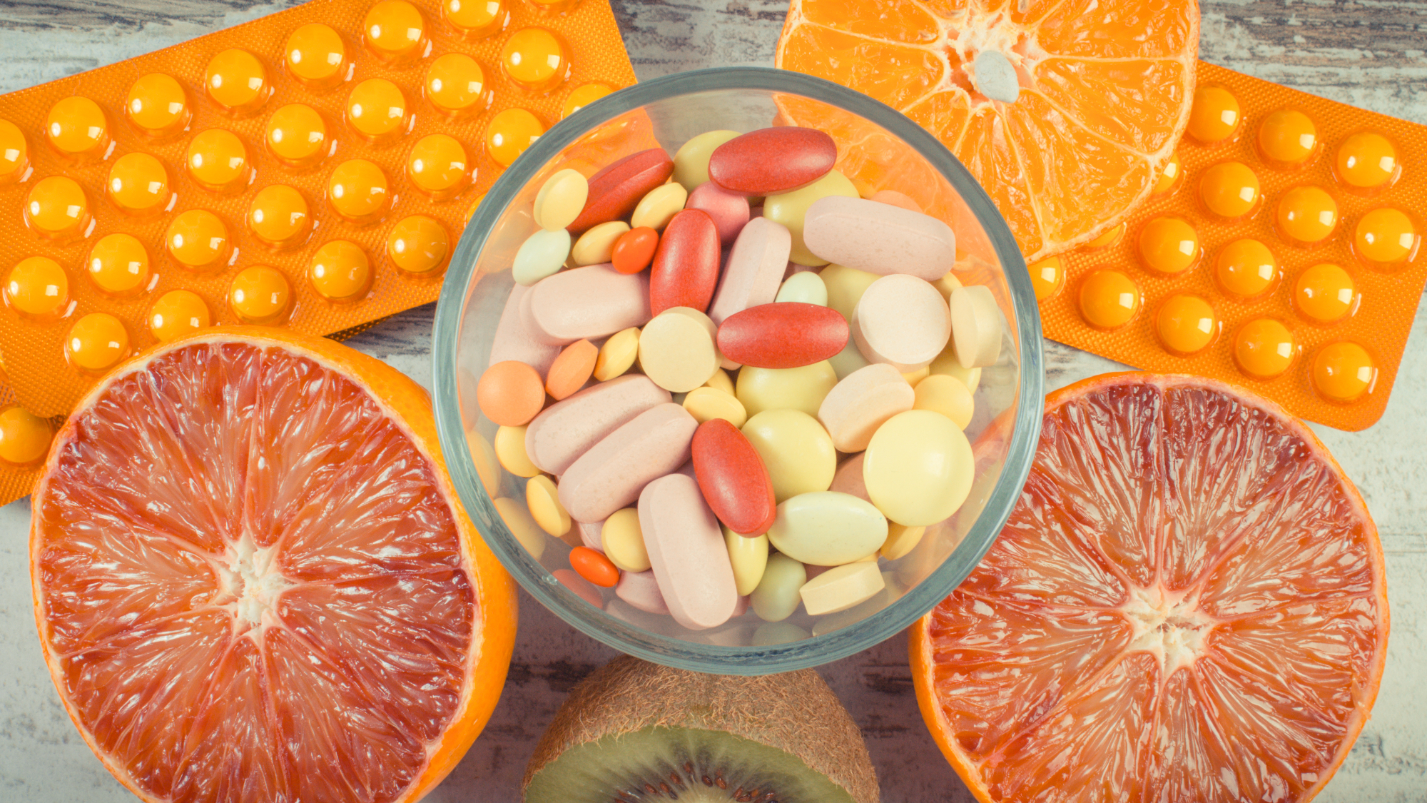 Natural fruits and medical pills. Choice between healthy nutrition and supplements Vitamin Synergy
